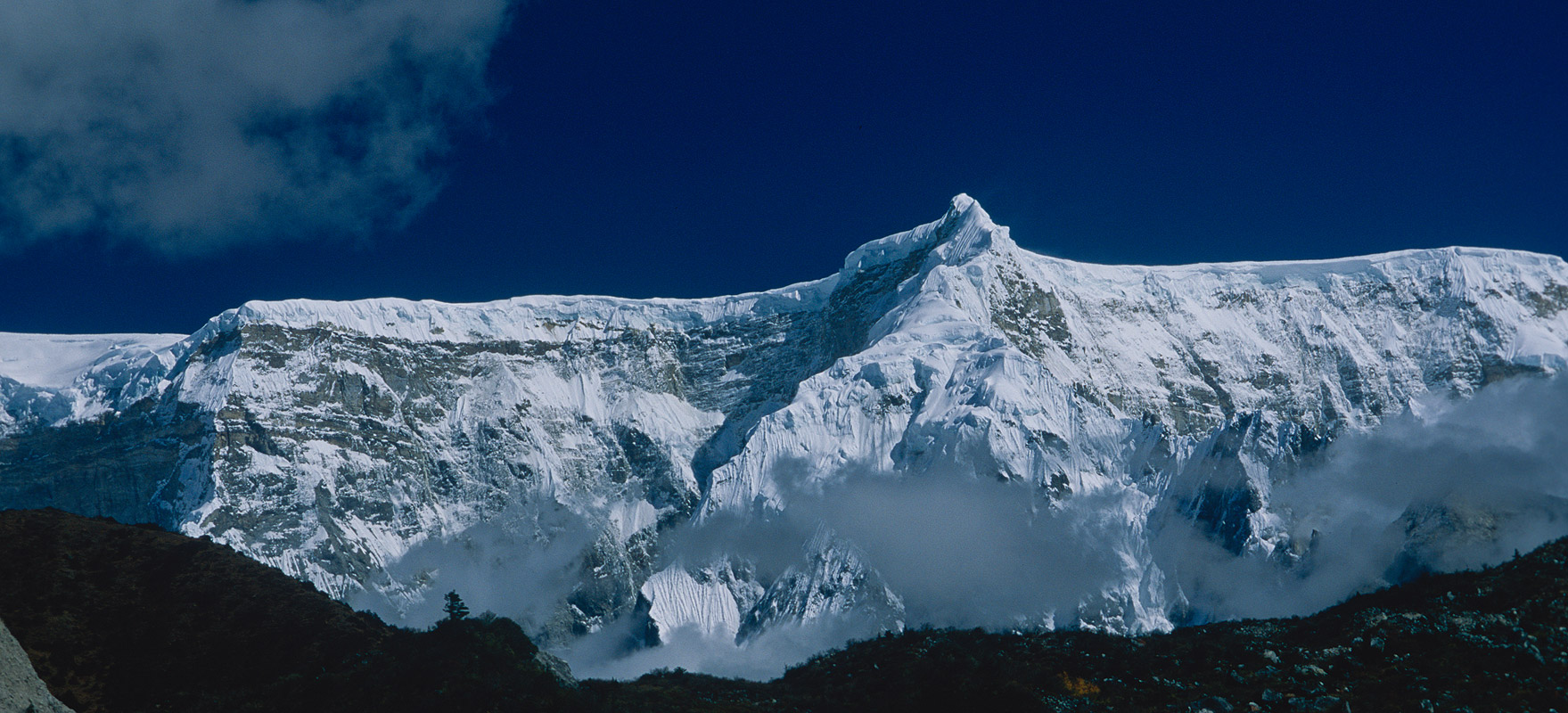 This vast 7000m peak forms the backdrop to the upper Pho Chhu valley and towers over Chozo and Thanza villages.Bronica ETRSi, 75mm, Fuji Velvia
