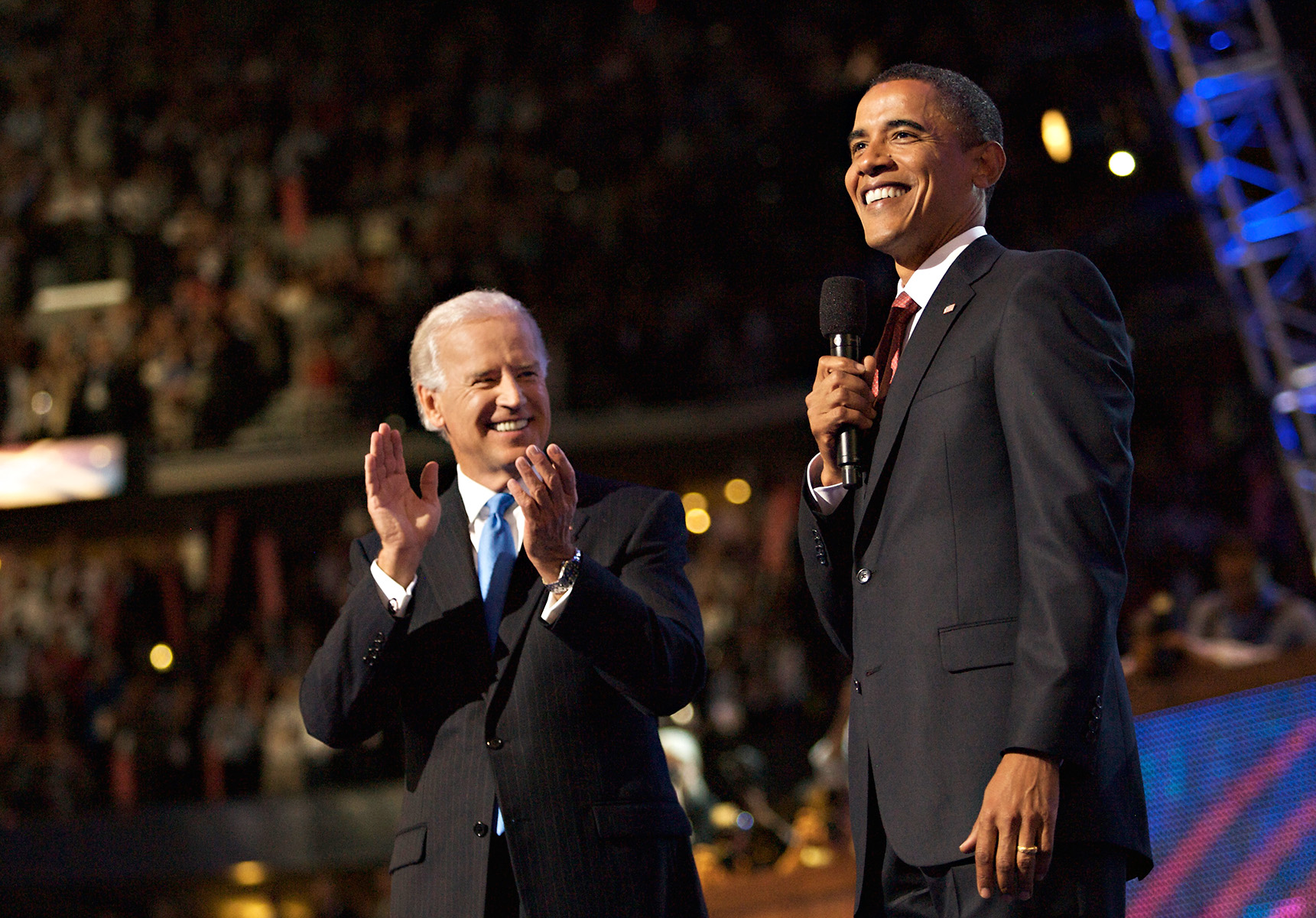 Barack Obama surprises his choice for vice president, Joe Biden, with an appearance on stage at the Democratic National Convention.