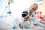 Columbia University Medical Center doctor examines patient 