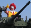 Ronald McDonald gives the thumbs up from the turret of a Lav 3 Armoured Personell Vehicle which was on display to celebrate Armed Forces day in Yellowknife, NWT, Canada.