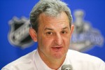 Darryl Sutter addresses the media after a playoff game at the Saddledome in Calgary.