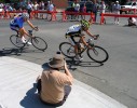 A photographer plies his trade as Jacob Erker and Jesse Collins ride one two as they comepete in the Bowness National Criterium Championships.