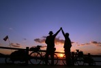 Succcessful completion of an adventure of this magnitude requires teamwork, trust, and a lot of hard work. Reid McCord and Aaron Whitfield celebrate the last sunset of the ride in Kyushu.