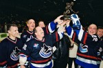 Tiger Williams and the rest of Vancouver Canucks Alumni  hoist the champions trophy after the team won the Three-on-Three Charity HockeyTournament in Calgary. 