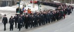 The funeral procession for fallen fire fighter, Cyril Fyfe, included hundreds of firefighters, RCMP, corrections staff, municipal enforcement officers and others. They solemnly marched in formation during the 1.5 kilometre march up Franklin Avenue in Yellowknife NWT, Canada. Yellowknifer photo by Aaron Whitfield