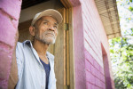 67 year-old Adolfo Gutierrez lived in a run-down shack in the neighborhood of La Gallina for 30 years, before moving into a Habitat home in 2013. © Habitat for Humanity International/Ezra Millstein