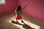 Five year-old Acacia Johnson carefully sweeps the floor of her soon-to-be bedroom, in her family’s new Habitat house.   Acacia lived with her mother Maryann and three year-old sister Amaya in a small home in Fairbanks, until they moved into this new three-bedroom Habitat home in July 2008.  It keeps them warm during the long Alaskan winters.  The girls have already found a way to combat the darkness of winter in the 49th state, by painting their bedrooms pink and purple.© Habitat for Humanity International/Ezra Millstein