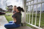 Samantha Short and her two year-old son Thomas moved into a FEMA trailer after an EF-5 tornado struck Joplin on May 22, 2011.  They partnered with Joplin Area Habitat for Humanity to build their own four-bedroom home in 2011.©Habitat for Humanity International/Ezra Millstein