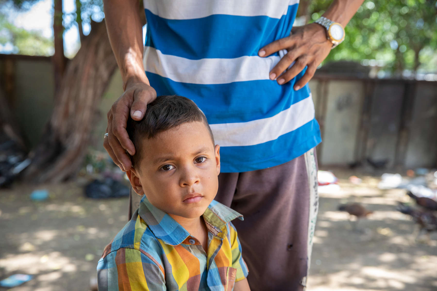 Eduard, 6. With his father Jose Eduardo Monasterio Castañeda, in front of their family's shack. Jose and his wife Ana Maria withstood the crisis in Venezuela for as long as they could, but when their situation grew so desperate that they were drinking glasses of water for dinner, they made the painful decision to leave their home and seek survival in Colombia. More than 1 million Venezuelans have fled to Colombia, fleeing economic, governmental and social collapse that has plunged the majority of the population into poverty, joblessness and near starvation. Many, like Jose and Ana Maria, are funneling into communities that already struggled with poverty and lack of opportunity, and resources are at a breaking point. Jose and Ana Maria now live with their five children in a small room at the back of another house along a busy street in Riohacha. They earn money selling small goods and mobile phone minutes on the street where they live, but the income is not enough and Jose worries about his children’s future. Mercy Corps is distributing emergency cash to help vulnerable Venezuelans in Colombia meet their urgent needs, including food, medicine and shelter. Ana Maria was pregnant with 3-month-old Fabiola when the family received their cash disbursement from Mercy Corps, and the money allowed her to get medical care for the birth. They say they would have had no way to go to the hospital without the assistance. The family also purchased essential household items for their shelter. 