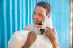 Farhan, 12, holds a goat in front of his family's house. His mother Safiya, 45, is a community leader in Hartasheik, Ethiopia. Mercy Corps trained her and several others in her community to help change dangerous traditional behaviors about women’s health and natural resource management. Now the community is connected to health services and protecting the vital land that provides for them.“Women should take leadership roles, and I feel comfortable doing it,” she says. “It’s obvious that women are taking the lead in Ethiopia. The leadership is there and women are taking hold of it.”