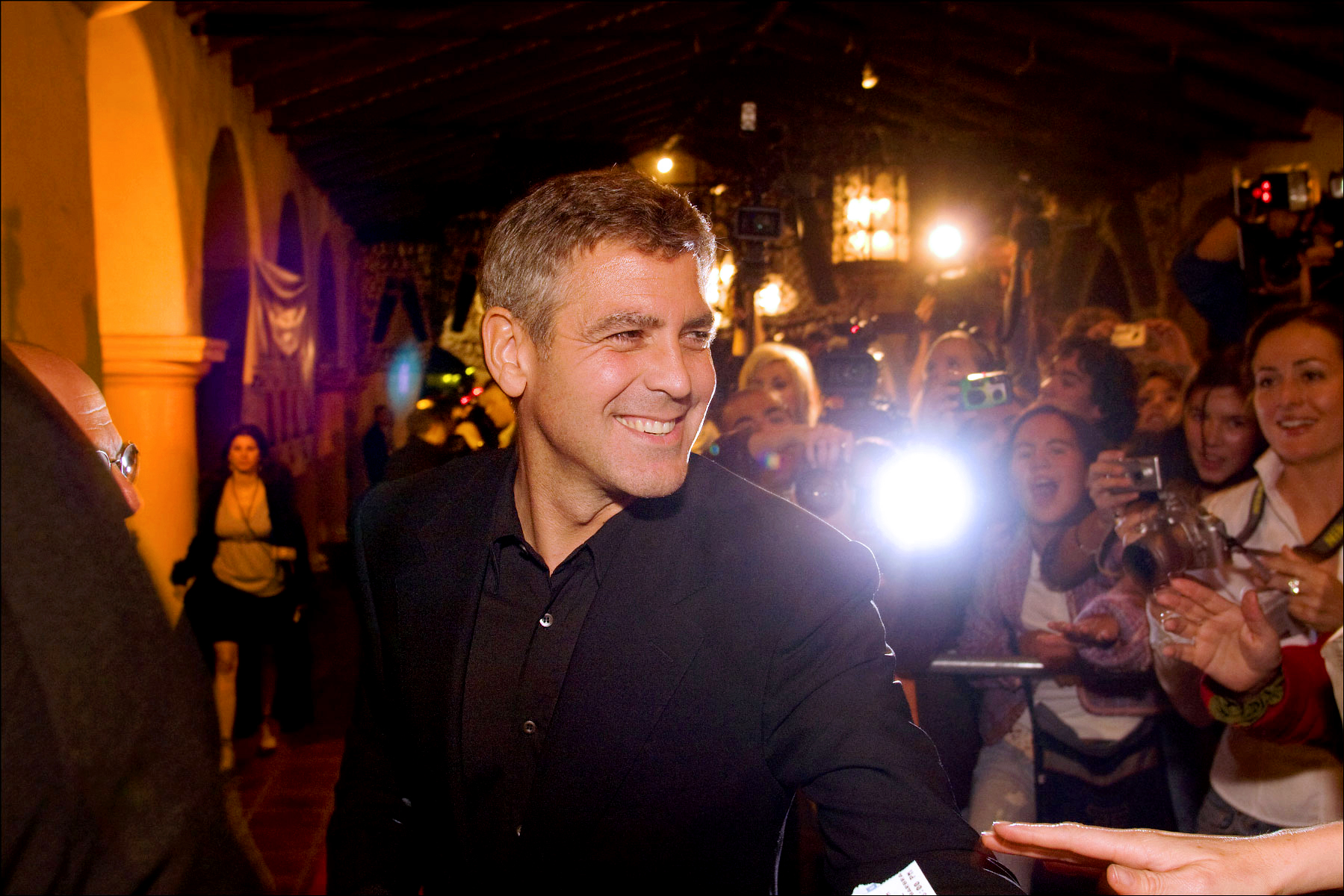 Walking the red carpet with actor George Clooney, at the Arlington Theater during the Santa Barbara International Film Festival.  (for The New Yorker)