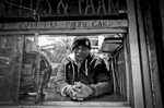 12,9,2015 Jackson Heights Queen. Neighborhood profile. Store owner, Mohamed Islam at his the store he's had  since 2001, near Roosevelt Ave subway stop. He's emigrated from Bangladesh in 1987. © 2015 Yunghi Kim/Contact Press Images.