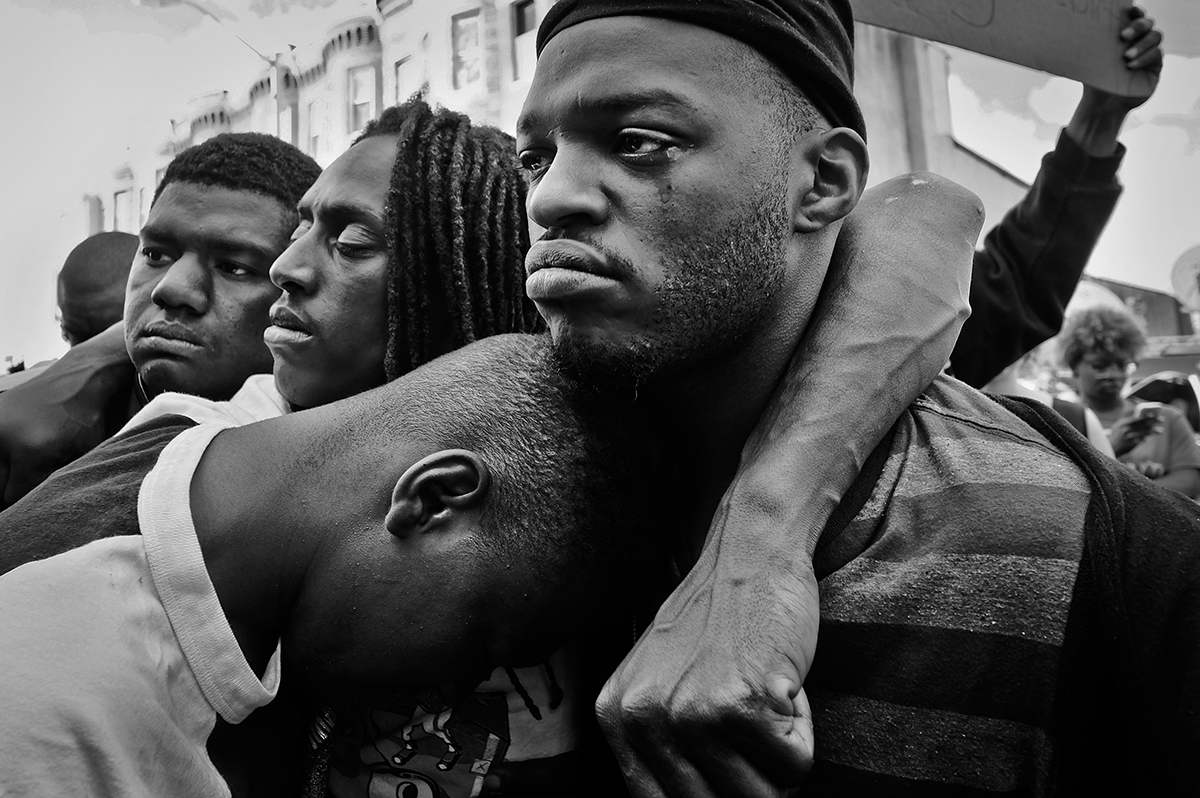 BALTIMORE, MD - APRIL 28, 2015 Protest  in West Baltimore near Monday's burned out CVS over death of Freddie Gray, 25, who died under severe police custody. Yunghi Kim photo /Contact Press Images