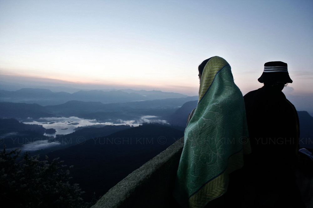 Adams Peak, Sri Lanka at sunrise on Buddha's birthday 2006. 