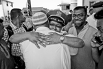 Ozone Park, Queens NY. 8/ 15/16  Shooting death of Imam Maulama Akonjee 55 years old and assistant Thara Uddin 64 years old  were shot dead in broad daylight August 13, 2016 in the Ozone Park neighborhood. Ozone Park is largely Bengali community was in shock and scared. NYPD lieutenant hugs a community member, after a peaceful protest.