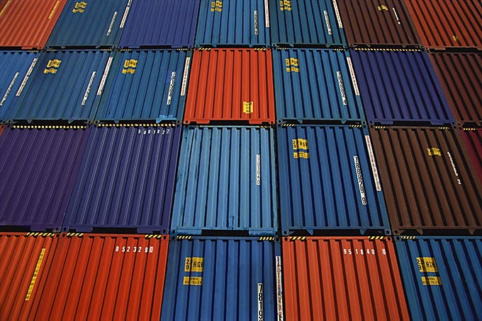 Piled high at the Long Beach, Ca Harbor,these shipping containers await their returnto Asia.A real life result of the (im)balance of trade.