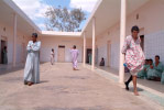 Female patients pace the courtyard in the Zenab Women’s Ward of the Rashad Psychiatric Hospital.