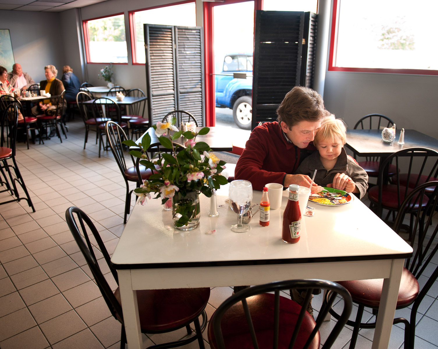 Huw Bower and his son Olly Bower eat breakfast at the Car Wash Café on route 3 in the historic town of Kilmarnock in the northern neck of Virginia. November 2, 2012. Vanessa Vick for The New York Times