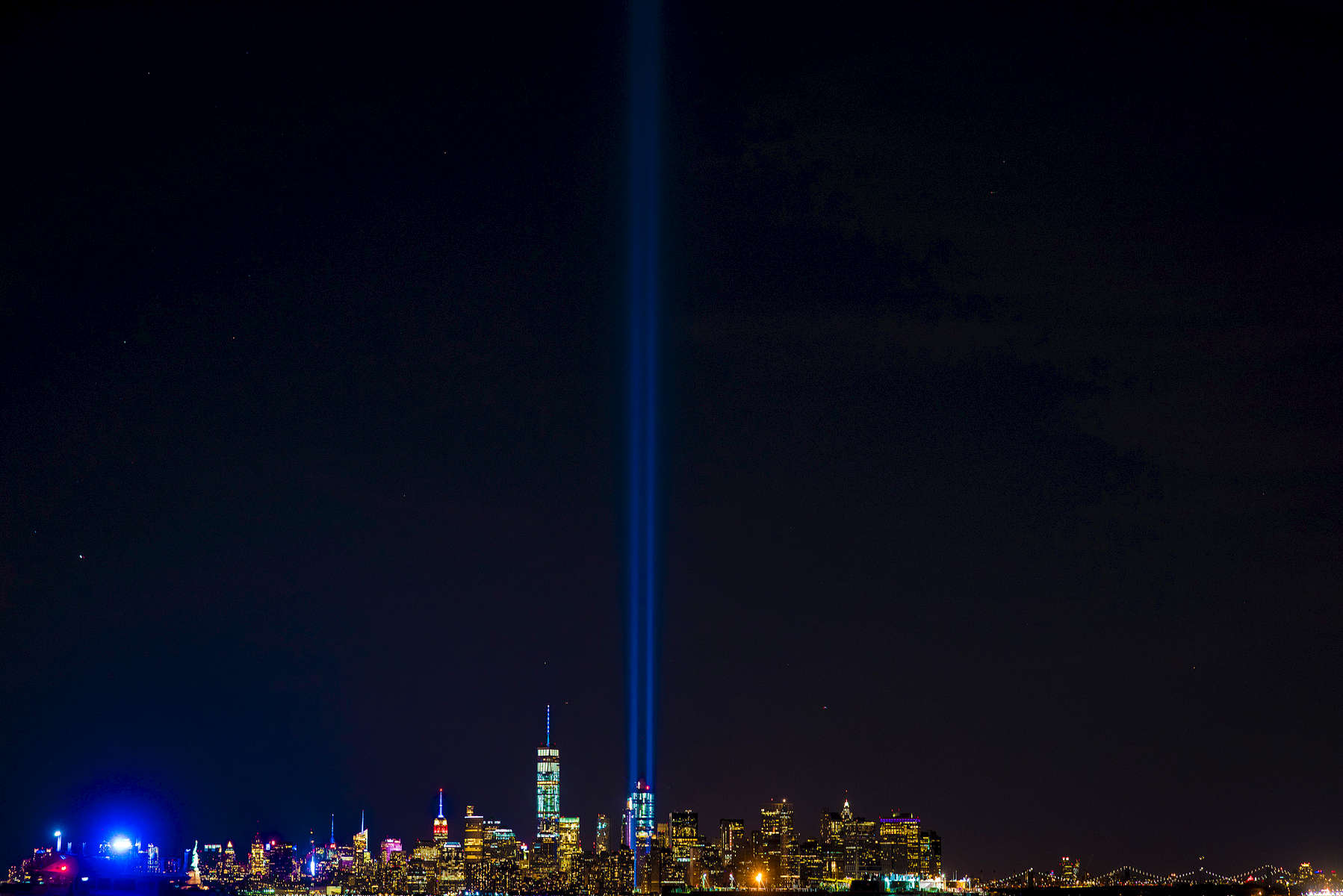 The Tribute in Light, photographed from Staten Island, rises over the Manhattan skyline on the 15th Anniversary of the 9/11 attack on Sunday, September 11, 2016. Michael Appleton/Mayoral Photography Office