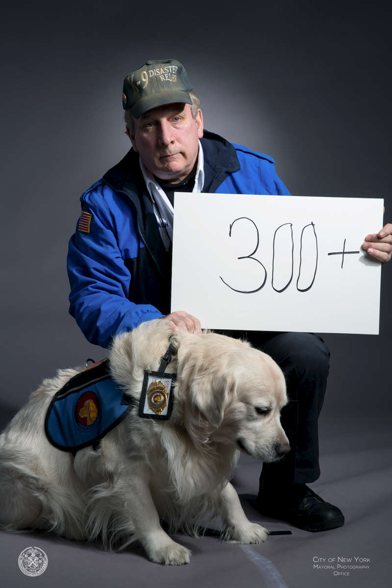 300+: dogs worked at ground zeroFrank Shane spent 9 months working at ground zero with Nikie, a crisis intervention dog.Frank, photographed with Chance, continues to work with crisis dogs. He now suffers from respiratory issues.