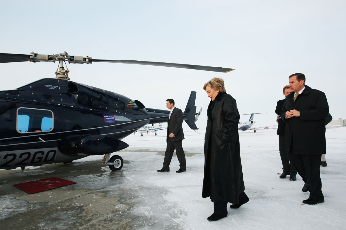 Former First Lady Hillary Clinton walks to a helicopter in Waterloo, IA on Jan. 19, 2007, en route to her fifth campaign stop of the day as she continued her quest to capture the Democratic presidential candidacy against then-Senator Barack Obama. 