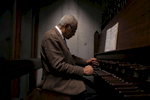 Riverside Church Carillonneur Dionisio Lind, 83, plays the carillon at Riverside Church in New York during the morning service on Sunday, January 18, 2015. The carillon at Riverside Church consists of of 72 bells ranging in weight from 10 pounds to 20 tons, all of which are housed atop a 392 foot tower. CREDIT:  Michael Appleton for The New York Times    
