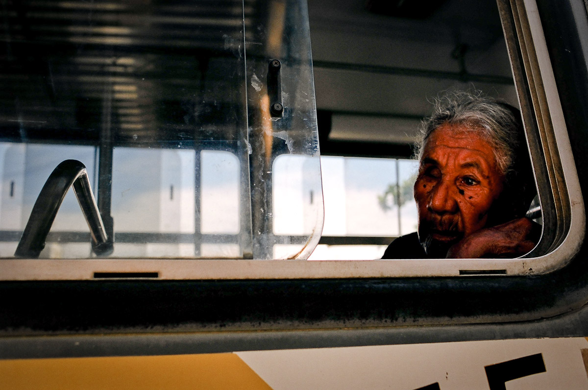A pilgrim waiting for a bus to leave Juazeiro do Norte