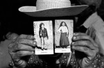 A pilgrim holding photographs of Jacinta and Francisco. Juazeiro do Norte, BrazilIn 1989, on the 72nd anniversary of the first appearance of Our Lady of Fatima, Pope John II officially recognized and beatified the herioc virtues of Francisco and Jacinta Marto. In late 1917, Jacinta and Francisco received apparitions of Our Lady at Cova da Iria, near Fatima, a city 110 miles north of Lisbon, Portugal. 