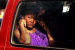 A woman sitting inside a mini bus in downtown Santo Domingo.