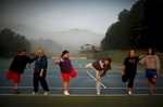 08/26/2011 *** Brevard, NCWellspring students are lead in stretching after their 6:30 AM morning walk.  Located in the mountains of North Carolina, Wellspring Academy is a boarding school for overweight children and young adults.  In addition to their regular classes, students learn to control their weight through a healthy diet, physical activity, and counseling.  (Travis Dove for NPR)