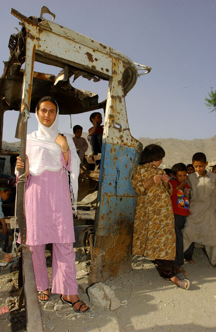  Zubaida Akbar, 15, highschool student, standing in the ruins of her nieghborhood in Karte Char area of Kabul, Afghanistan Zubaida was recently awarded a high school scholarship to study in Leysin, Switzerland for four years.