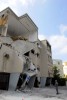 Apartment building destroyed by Katyusha rocket in Haifa, Israel