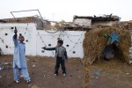 Christian Pakistani children playing with toy guns on Christmas day at a Christian colony in Islamabad, Pakistan.