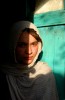 Marina Gulbahary,14, the young actress who was selected to play a little boy in the film, {quote}OSAMA{quote} after she was seen begging in the street. Marina stands outside her new home in Kabul, Afghanistan which she was only able to buy for her family after she made the film