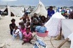At Pont-Rouge refugee camp, a big Haitian earthquake IDP family of Dormevil Tot, 28, stay in front of their tent where 12 people live together. Fortunately they didn't lose anyone due to the January 12th earthquake.