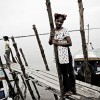 At the pier in Bani Shanta , teenaged sex-workers are waiting for customers coming by boat. Bani Shanta is a 600 or 700 hundred populated port village in Pashur river and more than half of the residents are sex-workers, making the life of the village dependant on prostitution job. 