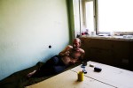 A newly arrived internally displaced person from Gori district -- Temur Meskhidze, 47 -- stays at a former Soviet military compound in Tbilisi, the capital of Georgia, as Russian troops continue to occupy large parts of the country. Aug 18, 2008.