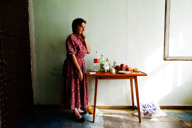 A newly arrived internal displaced person from Tskhinvali in South Ossetia -- Leila Chulukhadze, 49 --, stays at a former Soviet's military compound in Tbisili, the capital of Georgia, as Russian troops  still occupies a large part of the country. Aug 18 2008.