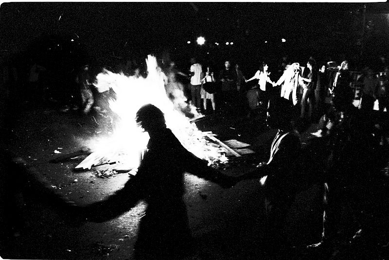 Demanding affordable housing, homeless people in Tompkins Sq Park and their supporters wage a protest with a bonfire in Avenue A adjoining to the park. July 1989.
