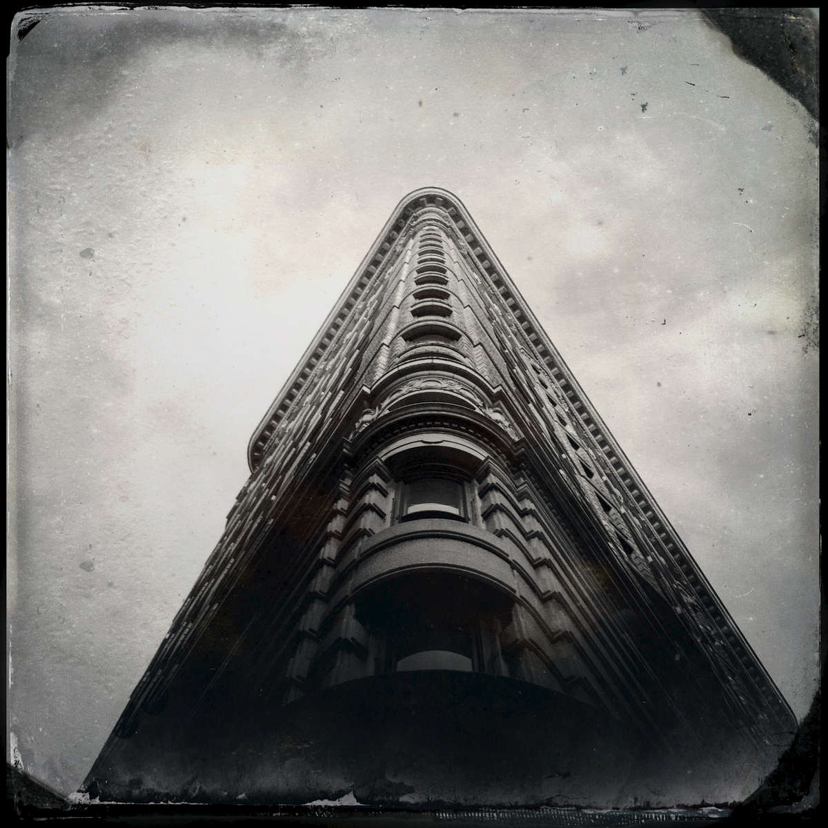 Flatiron Building in a muggy day, Sep. 2013.Self-MetaphorsThis is not only photo-documentary, but also a process of redefining of myself. All images were photographed after I was diagnosed with a cancer. Lucky it was a first stage and cured so far. Yet I still have a deep fear of the returning. In this sense, photography could be a therapy. Through the process, I can rethink of life and explore identity. Each photograph contains many of my own views or personal matters. Indeed, by doing so, I am exploring, even shooting self-metaphors of mine. The caption information: 