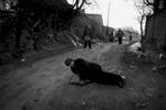 In the frigid remote town of Jixi, Heilongjiang Province, in China's North East, in the temperature of minus 20 C or minus 4 F or so, a woman slipped down, hurting severely, since the unsealed downhill street was frozen.China's North East was once called Manchuria. The region was at a crossroads that was manipulated in history, including the occupation by Russia and Japan. And now the area is facing upheavals due to the globalization with China’s rapid economic growth itself, creating the gap between the rich and the poor and even more unemployment.
