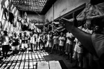 In a prison in Rio, gang inmates of Comando Vermelho join a Christian procession led by missionaries, while the prison is unhealthy and extremely crowded, and the situations are neglected by the government. Feb 2008.