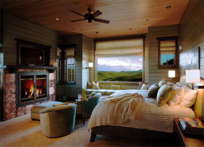 Interior guest bedroom with fireplace 