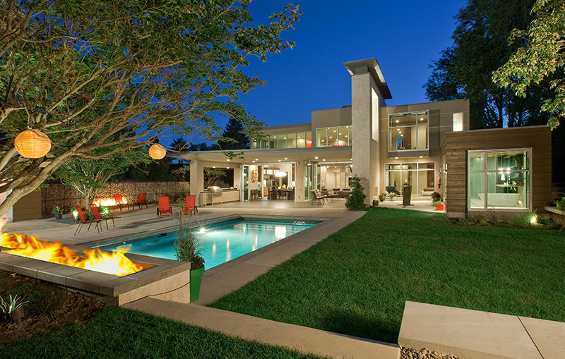 Exterior firepit, pool and backyard living area 