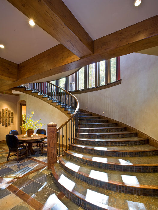 Interior lower level bottom of granite/tile stairs 