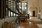 Interior stairwell and grand piano