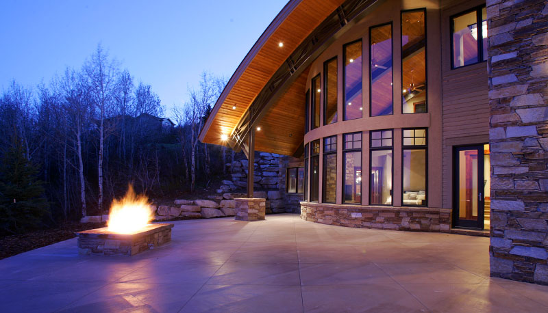Exterior back patio deck with fireplace