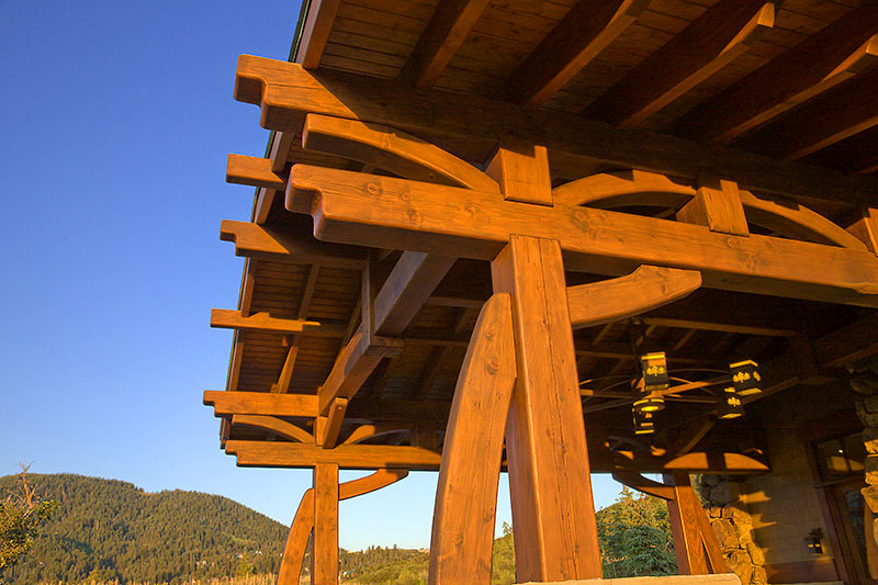 Exterior wooden structual beams supporting the porte cochere 