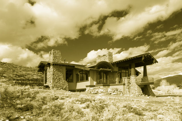 Exterior left side angle view of the front of property with yellow filter