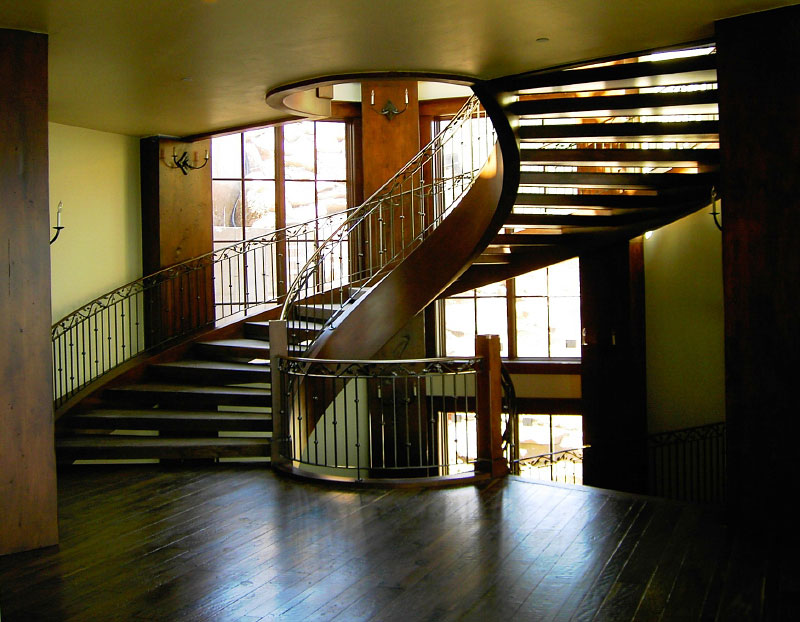 Interior  second level view of wooden stairwell